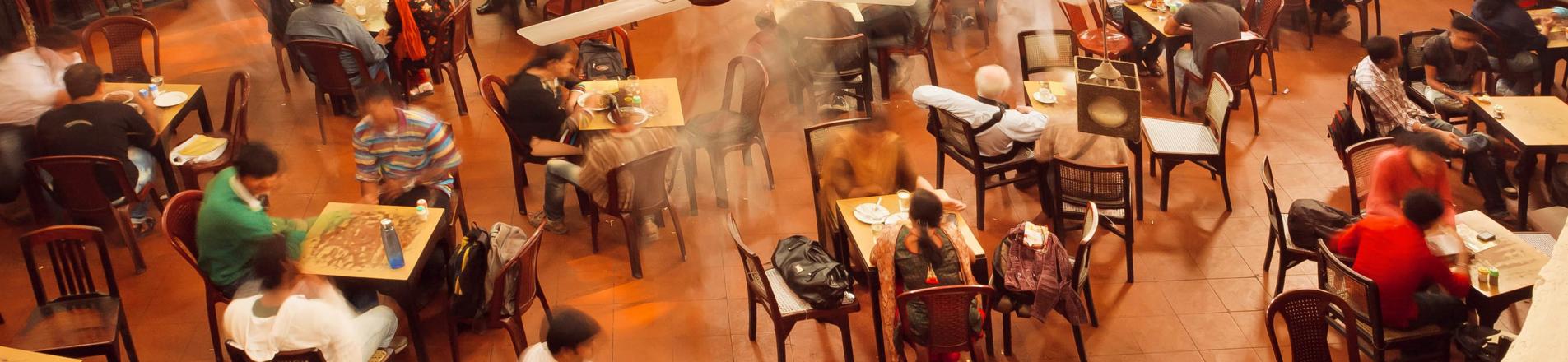 People eating in canteen India