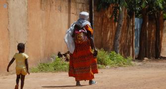 mother with two children in Burkina Faso