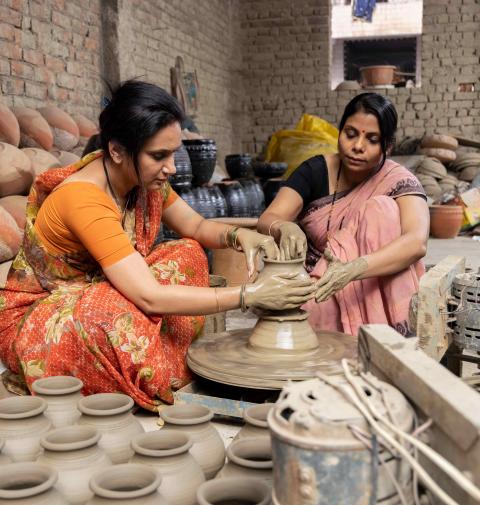 Women working on pots