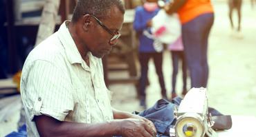 man tailors clothes in ghana