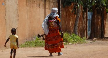 mother with two children in Burkina Faso