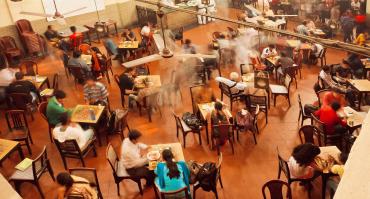 People eating in canteen India