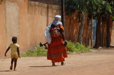 mother with two children in Burkina Faso