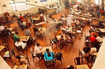 People eating in canteen India