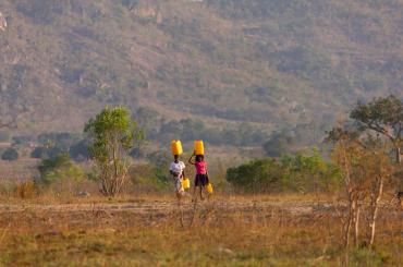 Girls carrying water